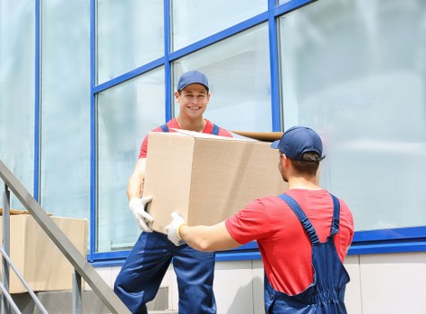 Professional moving team in Bromley with a moving truck